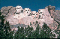 George Washington, Thomas Jefferson, Teddy Roosevelt, and Abraham Lincoln.  Missing: Otto Mandelstein.